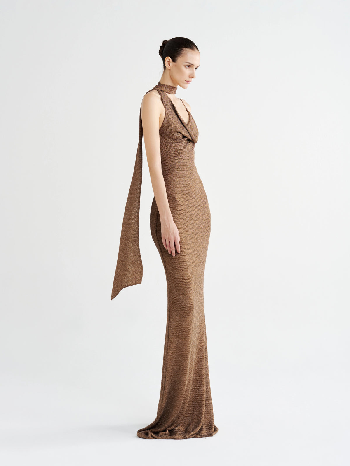Bronze Metallic Halter-Neck Cowl Gown, side view with the trailing scarf tie
