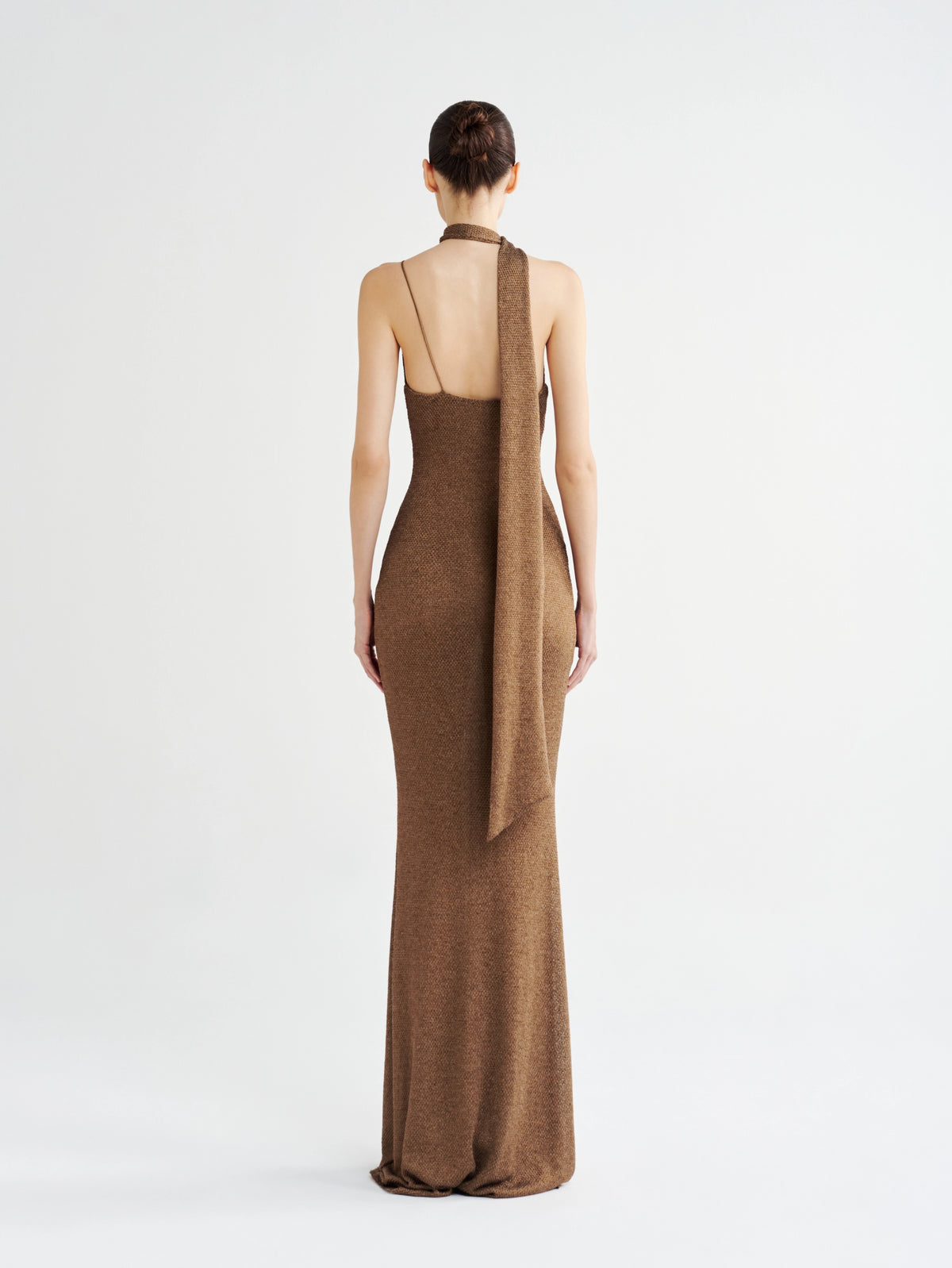 Bronze Metallic Halter-Neck Cowl Gown, back view with the scarf tie down the low back